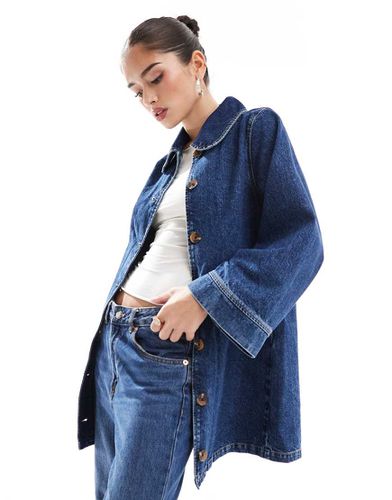 Veste longue en jean - Indigo - Asos Design - Modalova