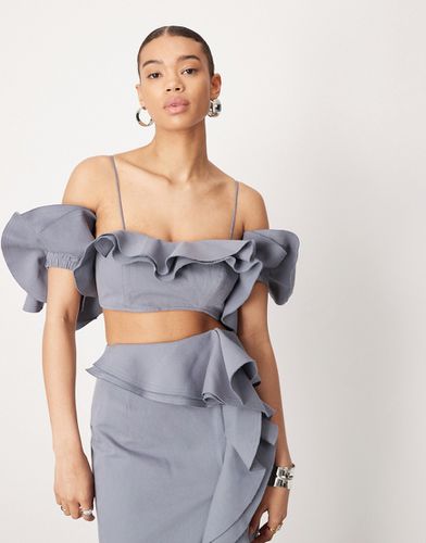 Ultimate - Crop top d'ensemble à volants à bords bruts - Asos Edition - Modalova