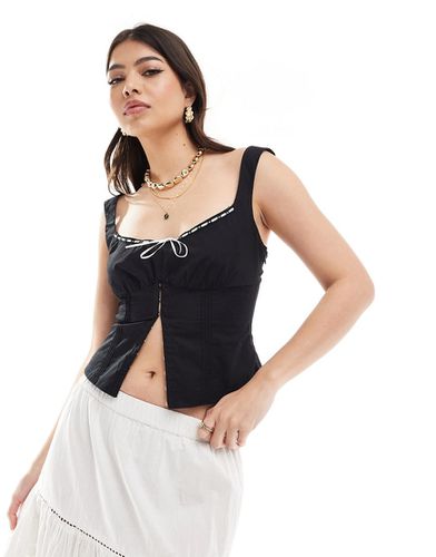 Top style corset à ruban contrastant - et blanc - Bershka - Modalova
