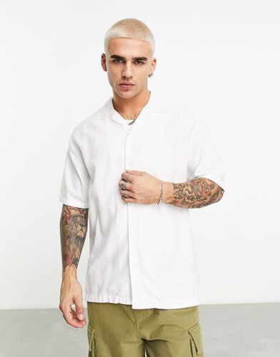 Chemise décontractée rustique - Bershka - Modalova