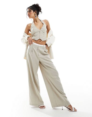 Pantalon ajusté coupe ample avec taille à détail caleçon - Beige clair - Bershka - Modalova