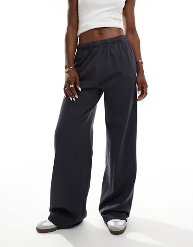 Pantalon de jogging ample à enfiler - foncé - Bershka - Modalova