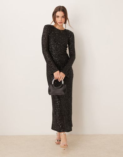 Robe longue à sequins avec manches évasées et dos ouvert - Gina Tricot - Modalova