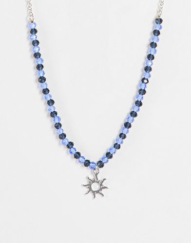 Collier de petites perles avec pendentif soleil - Designb London - Modalova