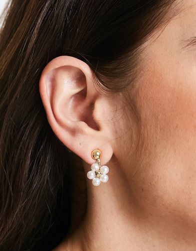 Boucles d'oreilles avec fleurs en perles - Designb London - Modalova