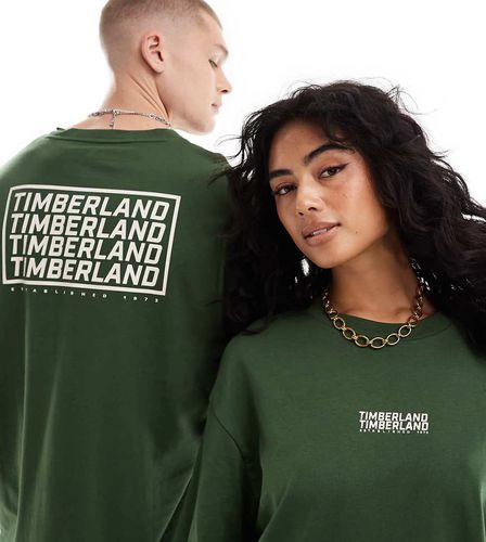 Exclusivité ASOS - T-shirt oversize avec logo répété - foncé - Timberland - Modalova