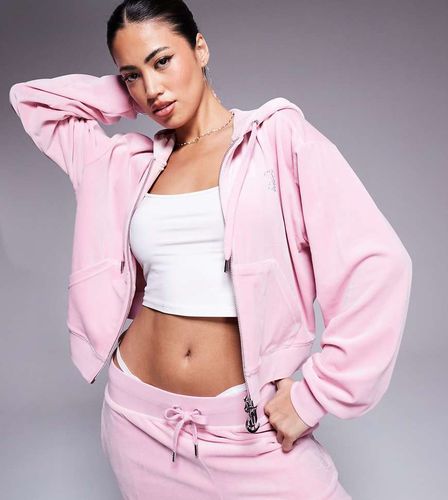 Exclusivité ASOS - Sweat à capuche décontracté en velours avec fermeture éclair - poudré - Juicy Couture - Modalova