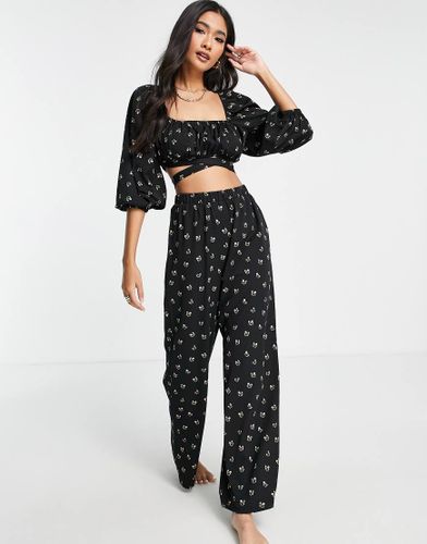 Exclusivité - Pantalon d'ensemble de plage large - Noir à fleurs - Fashion Union - Modalova