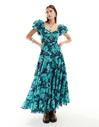 Robe longueur mollet à imprimé fleuri avec manches bouffantes et volants étagés - Bleu - Free People - Modalova