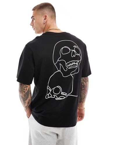 T-shirt oversize à imprimé têtes de mort dans le dos - Jack & Jones - Modalova