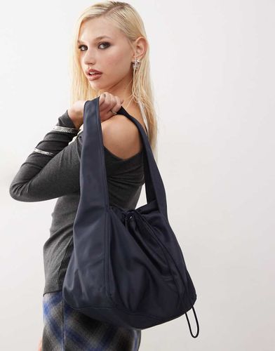 Sac porté épaule en nylon avec lien coulissant - Monki - Modalova