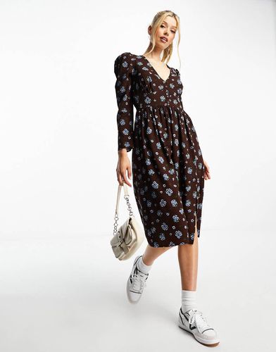 Robe mi-longue à fleurs avec boutons et manches longues - Monki - Modalova