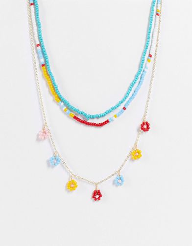 Madein - Collier multi-rangs avec pendentif fleurs et perles - Madein. - Modalova