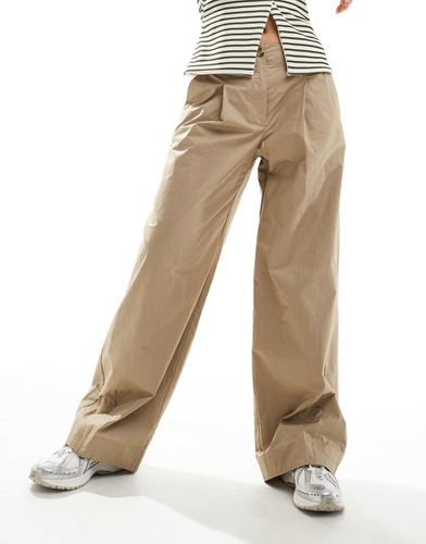 Pantalon droit coupe fluide boutonné - Beige - Mango - Modalova