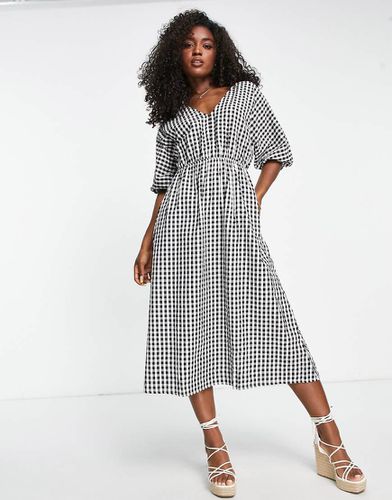 Robe mi-longe à manches bouffantes et laçage dans le dos - vichy - Mango - Modalova