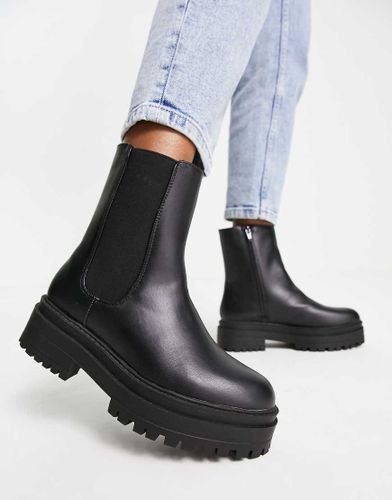 Bottines Chelsea plates avec semelle chunky à crampons - Noir - New Look - Modalova