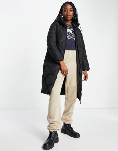 Manteau long matelassé en losanges - New Look - Modalova