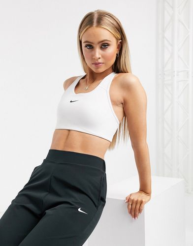 Brassière de sport maintien moyen en tissu Dri-Fit avec logo virgule - Nike Training - Modalova