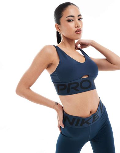 Pro Indy - Brassière de sport à décolleté plongeant et maintien modéré - Nike Training - Modalova