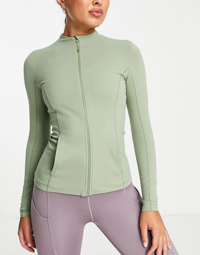 Nike - Yoga Luxe - Veste ajustée en tissu Dri-FIT avec fermeture éclair - sauge - Nike Training - Modalova