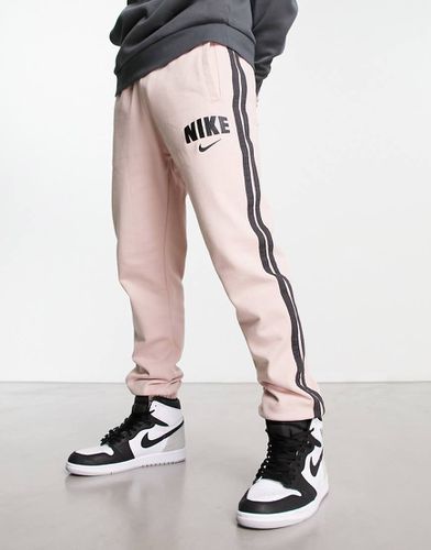 Survetement nike outlet gris et rose