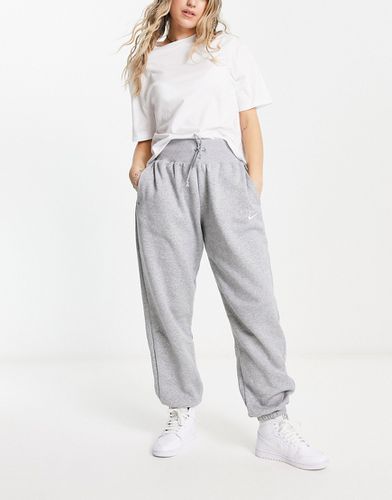 Pantalon de jogging taille haute oversize avec petit logo virgule - et voile - Nike - Modalova