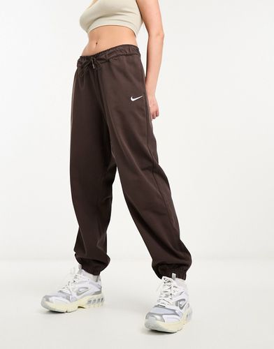 Pantalon de jogging tendance en jersey - Marron baroque - Nike - Modalova