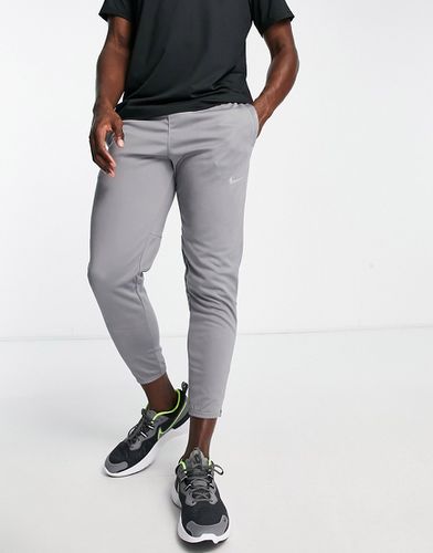 Challenger Repel - Pantalon de jogging en tissu Therma-FIT - Nike Running - Modalova