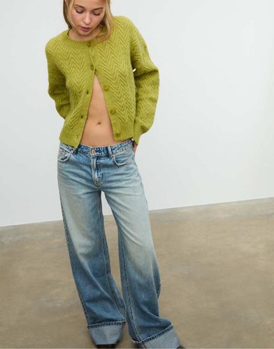 Gilet en maille torsade - olive - Stradivarius - Modalova