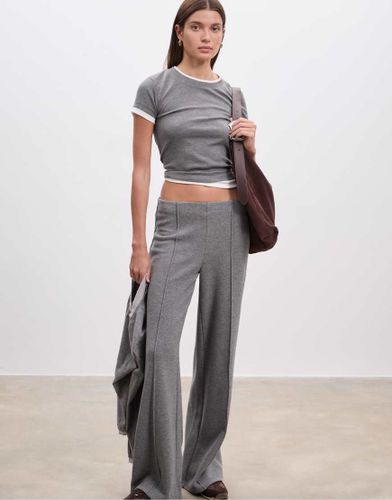 Pantalon en maille  surpiqres - fonc - Stradivarius - Modalova