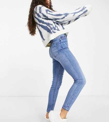 Petite - Jean skinny à taille ultra haute - clair - Stradivarius - Modalova