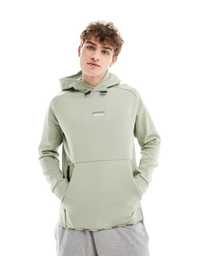 Sport - Sweat à capuche ample en tissu technique avec logo - herbes marines - Superdry - Modalova