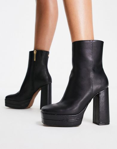 Bottines à talon et double semelle plateforme - River Island - Modalova