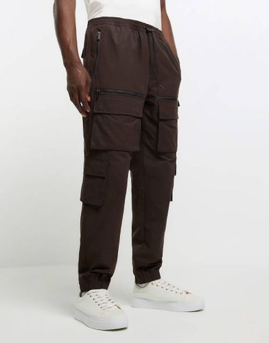 Pantalon cargo à poches - River Island - Modalova