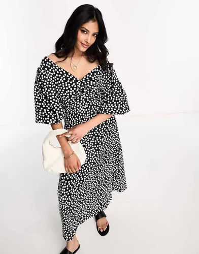 Robe à pois mi-longue avec manches bouffantes - River Island - Modalova