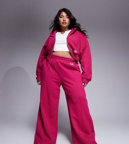 Weekend Collective Curve - Pantalon de jogging d'ensemble droit en tissu épais à plis nervurés - Rose intense - Asos Weekend Collective - Modalova