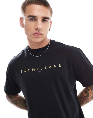 T-shirt avec logo linéaire doré - Tommy Jeans - Modalova