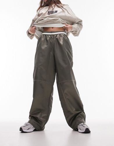 Pantalon de basketball en nylon à taille en jersey - Kaki - Topshop - Modalova