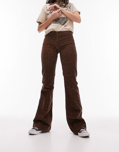 Pantalon évasé taille basse en velours côtelé à imprimé léopard - Topshop - Modalova