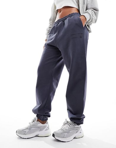 Pantalon de jogging décontracté à motif graphique - Bleu pétrole - The Couture Club - Modalova