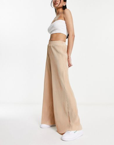 Pantalon en tissu plissé - Beige - Urban Revivo - Modalova