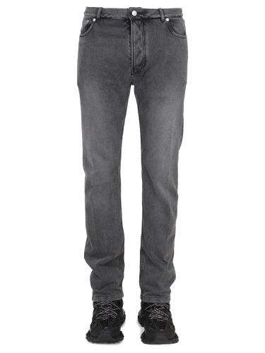 Balenciaga jeans con patch logo - balenciaga - Modalova