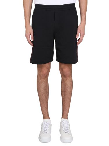 Bermuda shorts with selvedge logo band - alexander mcqueen - Modalova