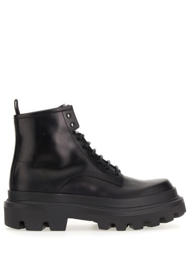 Ankle boot with logo plaque - dolce & gabbana - Modalova