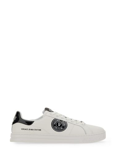 Sneaker with logo - versace jeans couture - Modalova