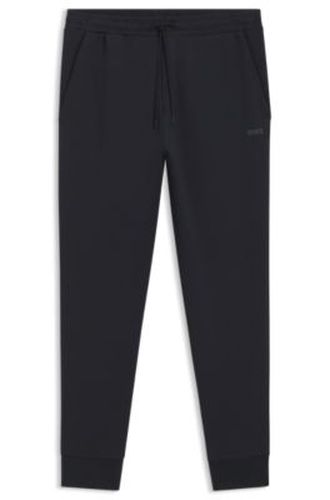 Bas de survêtement en coton stretch avec logo imprimé - Boss - Modalova