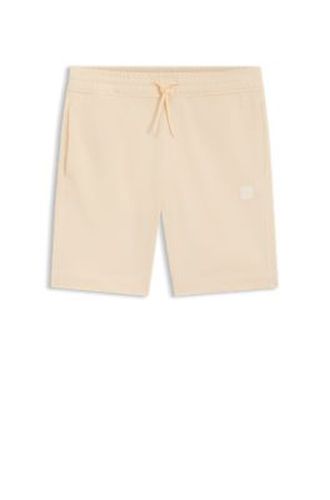 Short en molleton de coton avec écusson logoté - Boss - Modalova