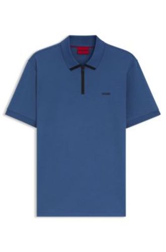 Polo en piqué de coton avec logo contrastant - HUGO - Modalova