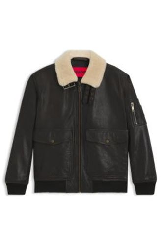 Blouson aviateur en cuir à col en fourrure synthétique - HUGO - Modalova