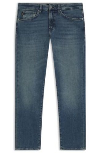 Jean fuselé en denim stretch délavé - Boss - Modalova
